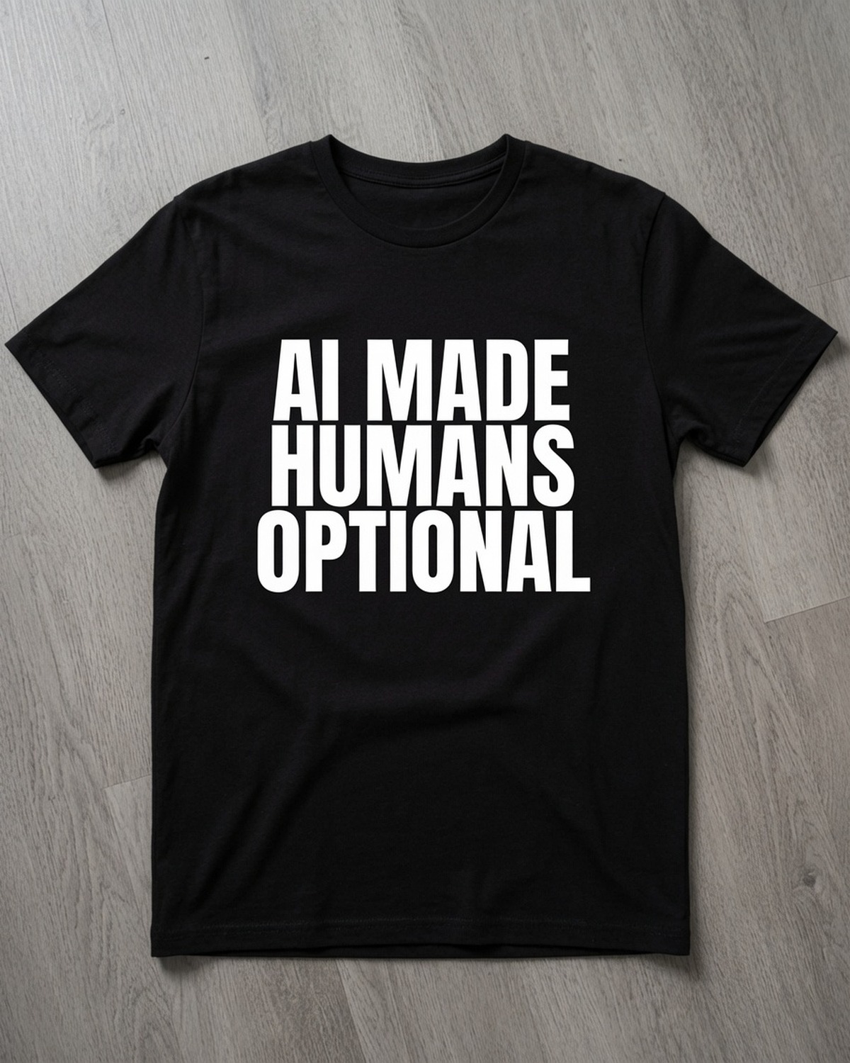 AI Made Humans Optional tee arranged on a clean wood surface